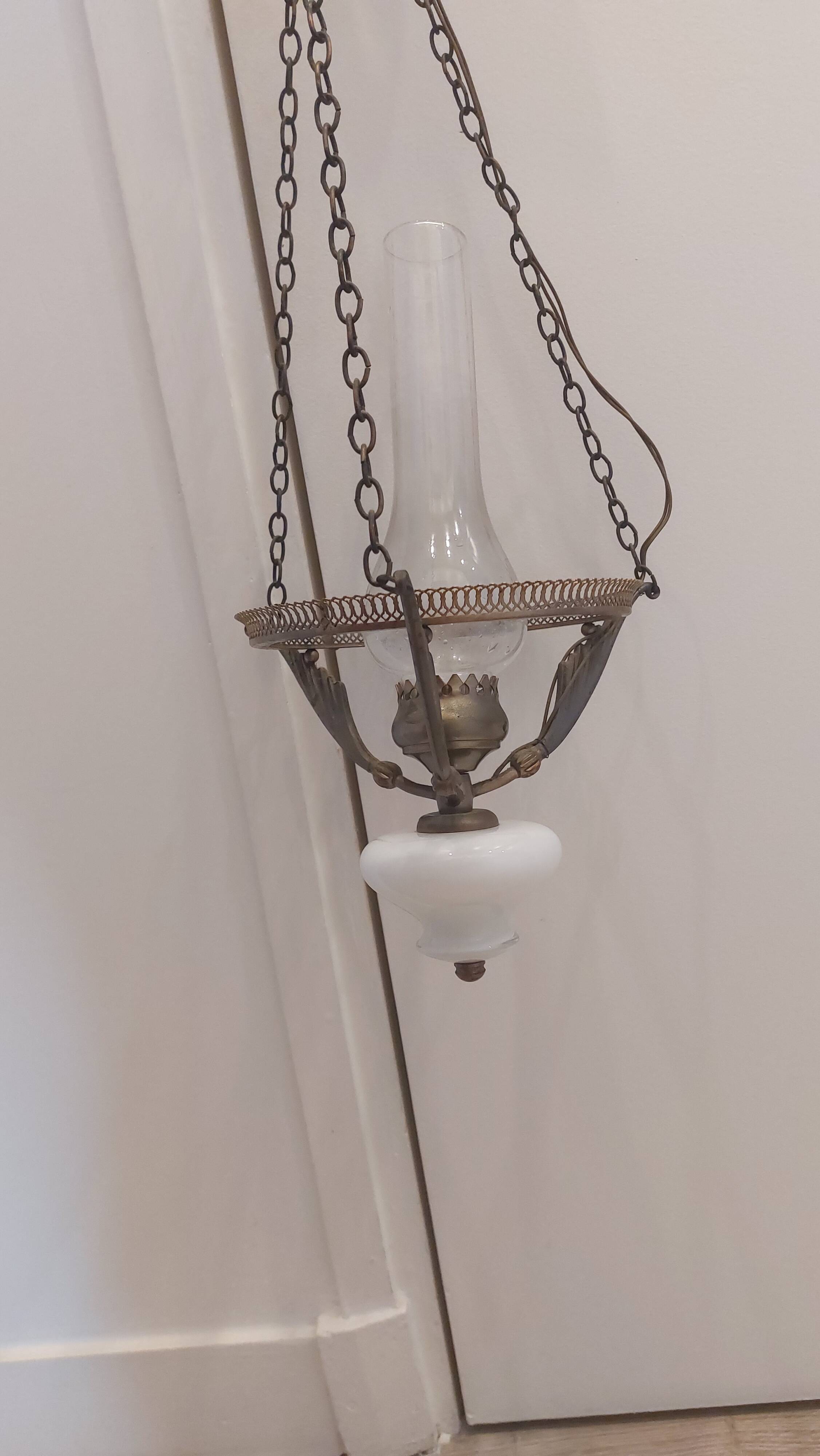 Lots of 1950s copper/ brass suspensions and wall lights with shades.