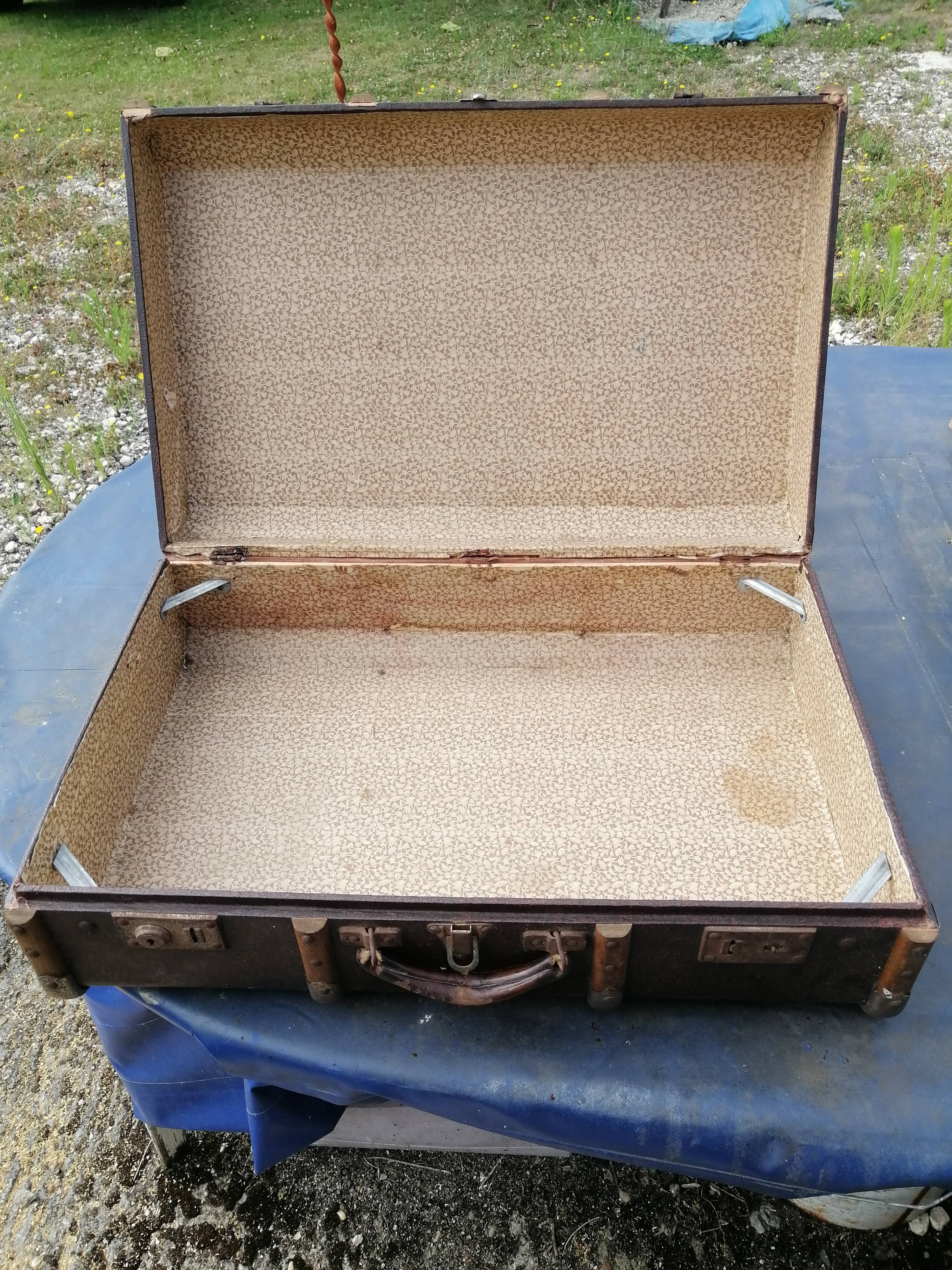 Antique suitcase in leather wood and vintage metal