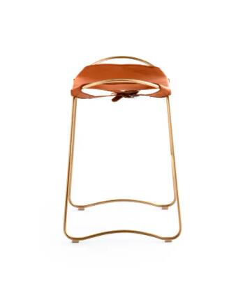 Contemporary kitchen bar stool in aged brass metal and tan leather.