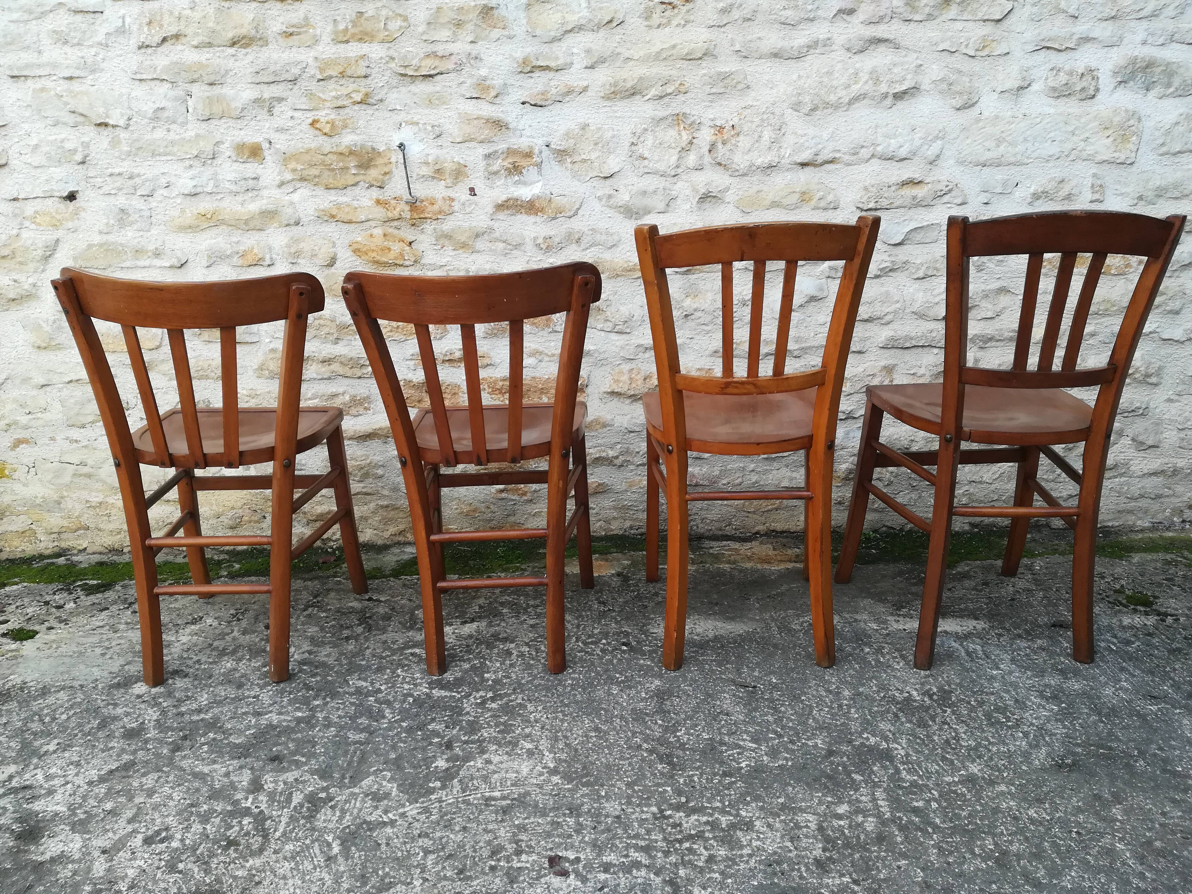 Set of 8 mismatched bistro chairs