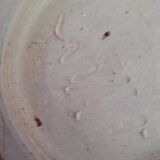 Cut in varnished sandstone with a blue