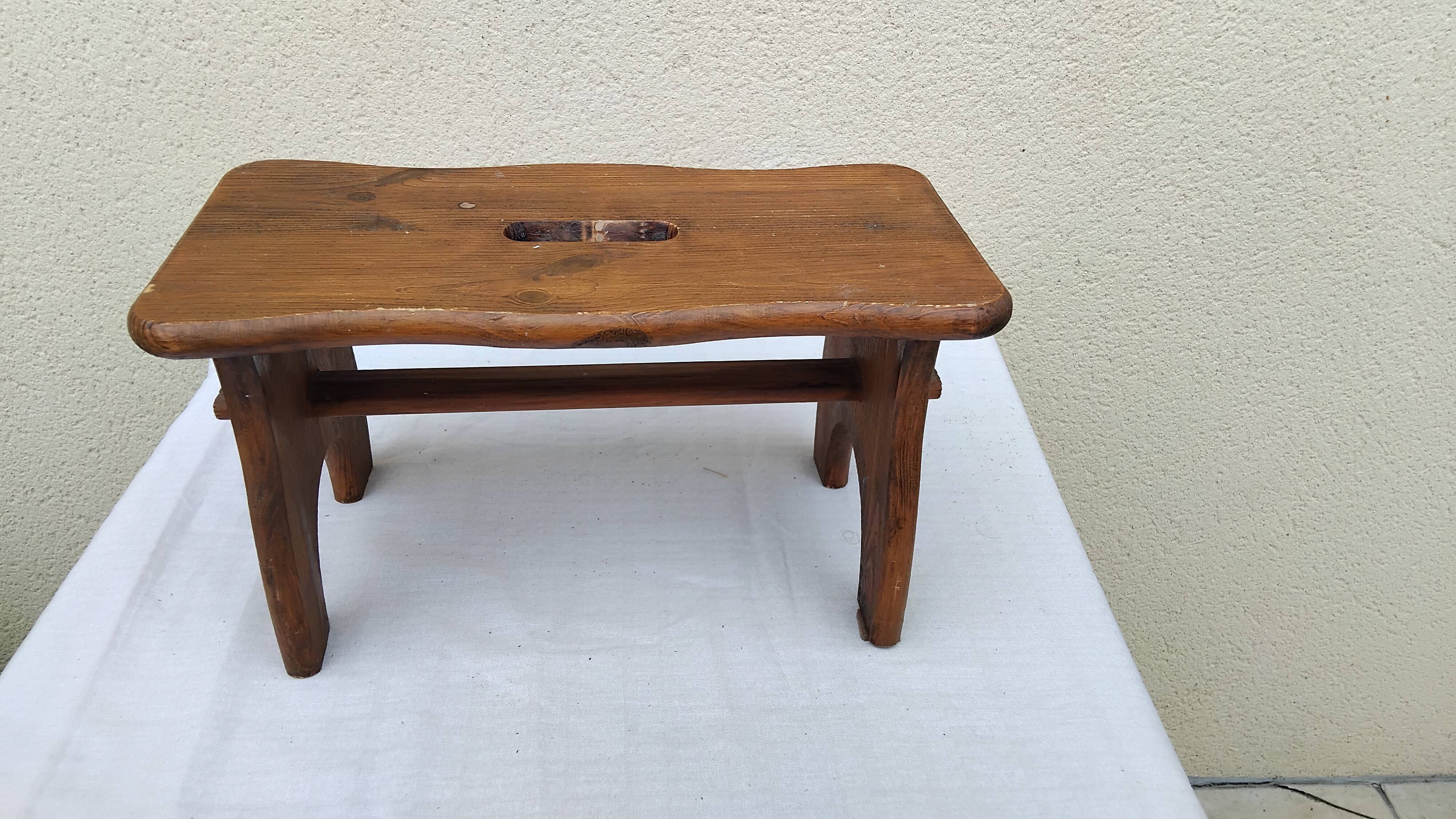 Old small vintage farm stool