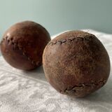 Two old nineteenth century leather golf balls
