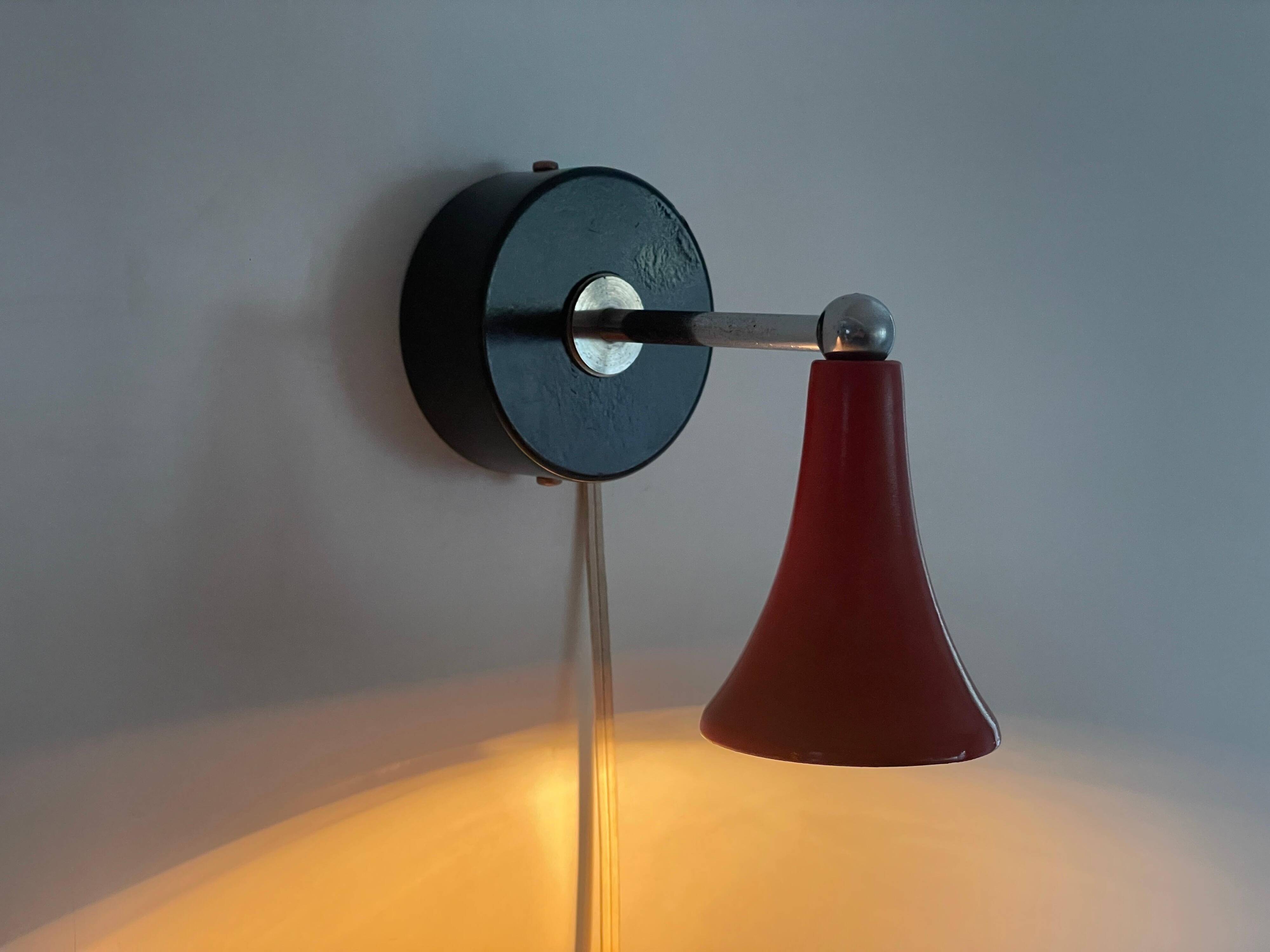 Pair of red metal wall lights AGE, 1970s, Italy