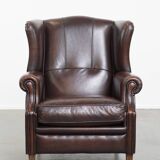 Very beautiful wing chair made of cowhide leather in English style