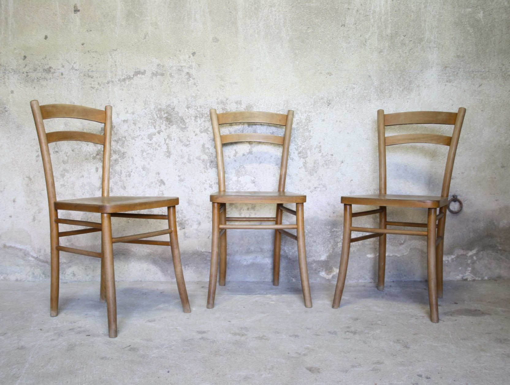 Three Luterma bistro chairs