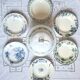 Antique deep plates in ironstone with a soup tureen.