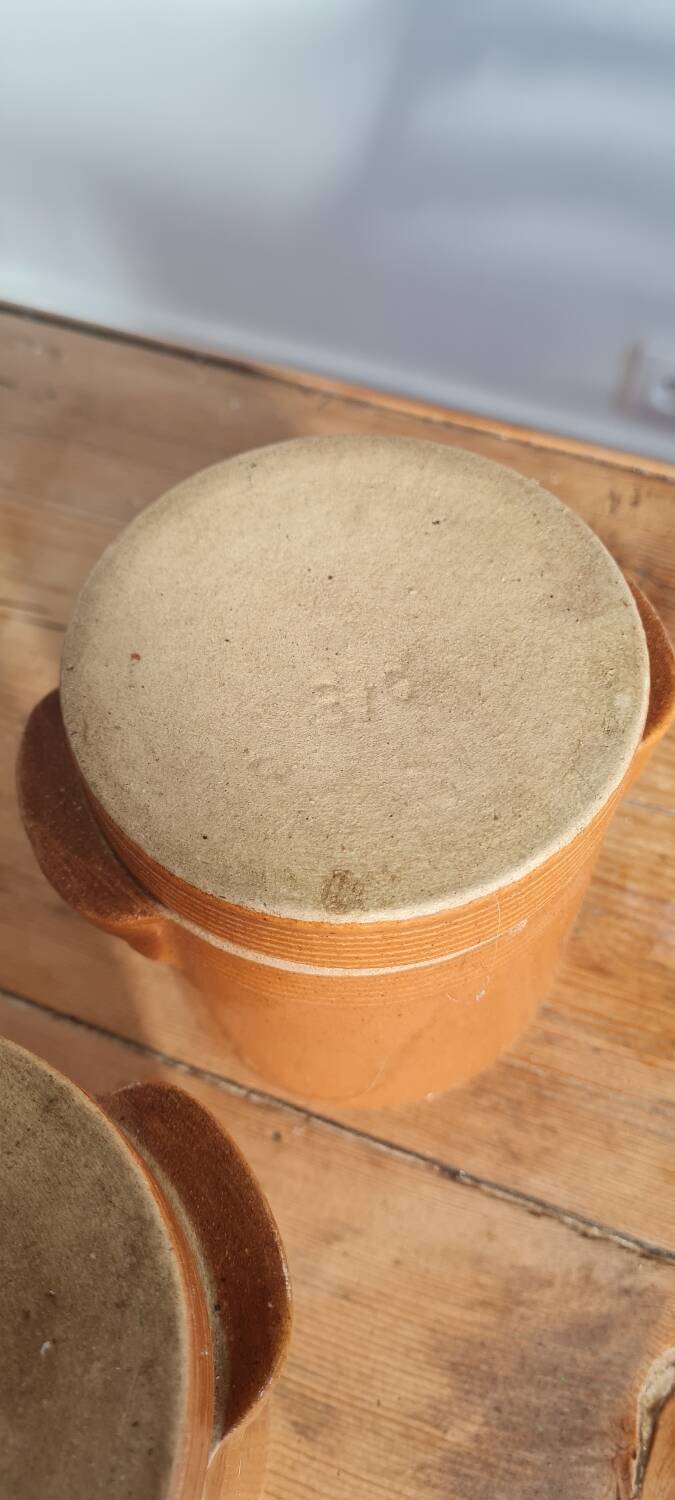 Pair of stoneware grease pots