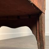 English commode from the George III Regency period, bombe shape in mahogany veneer.