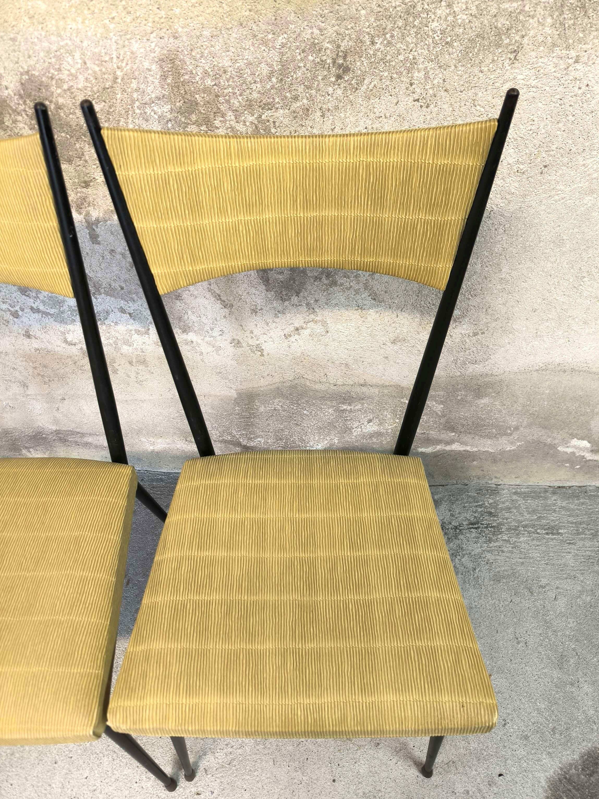 Three vintage chairs in the style of Colette Gueden.