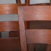 Set of 6 oak chairs in the style of Jean Pascaud, 1940.