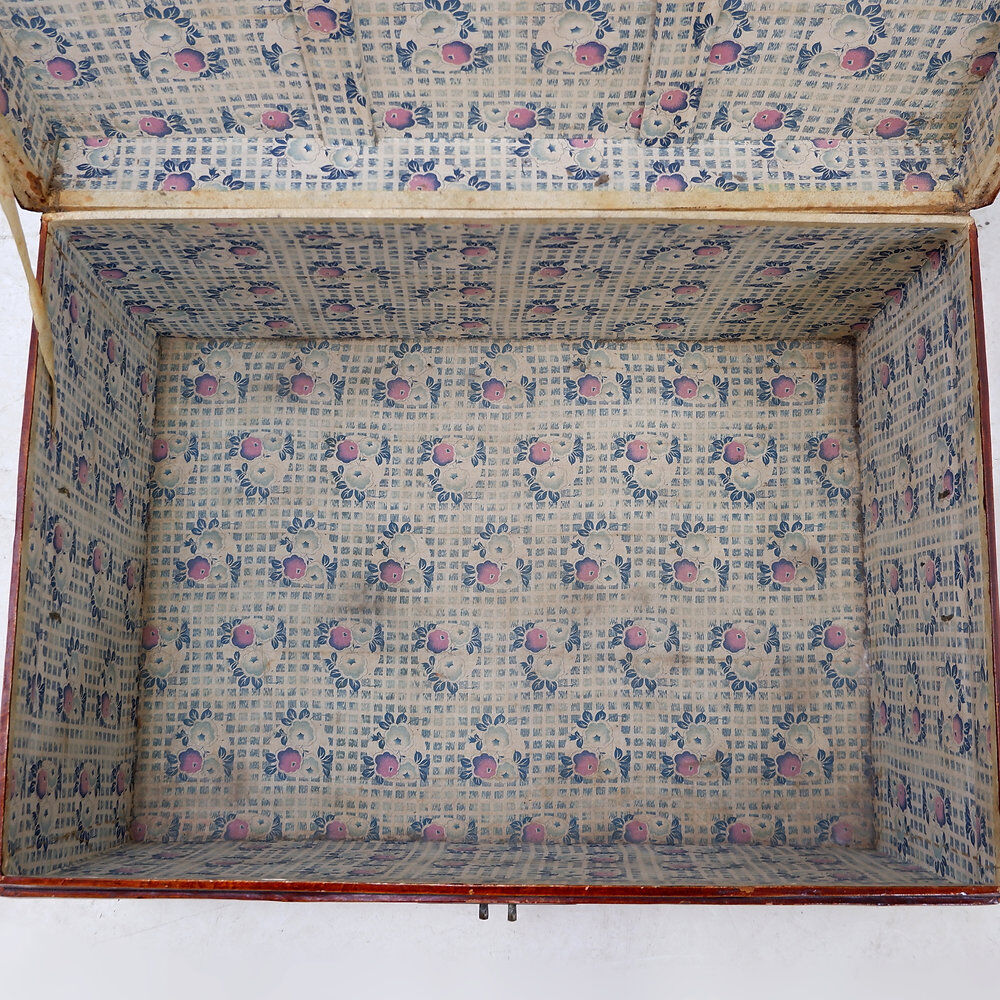 Chinese red lacquered leather trunk from the early 20th century.