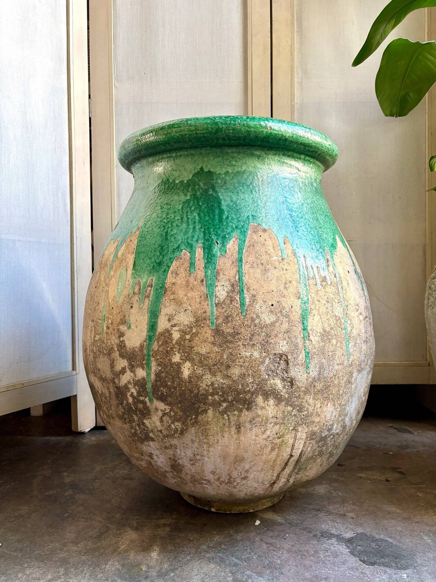 Biot jar, plant pot in beige and green glazed ceramic