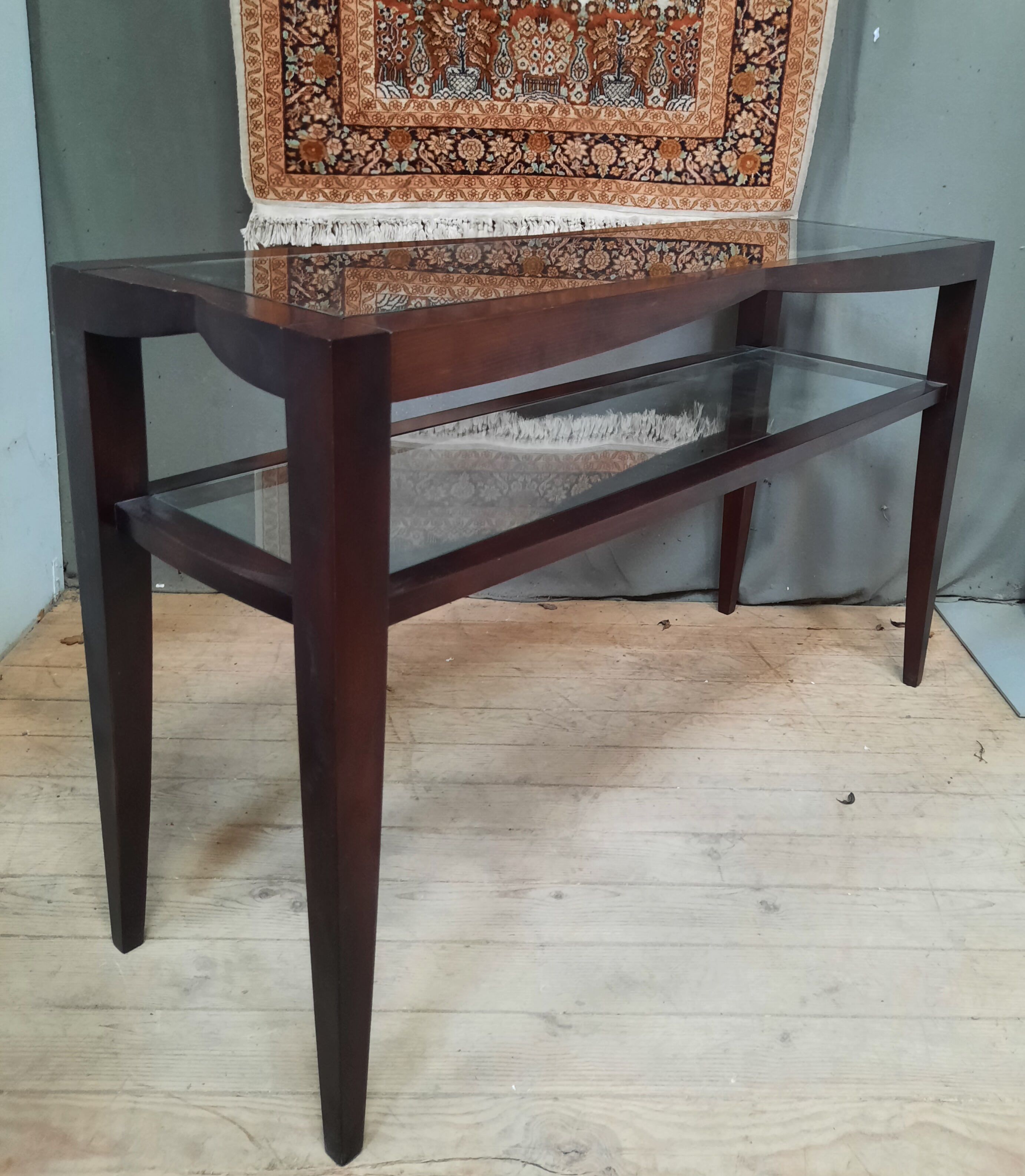 Contemporary console in varnished wood