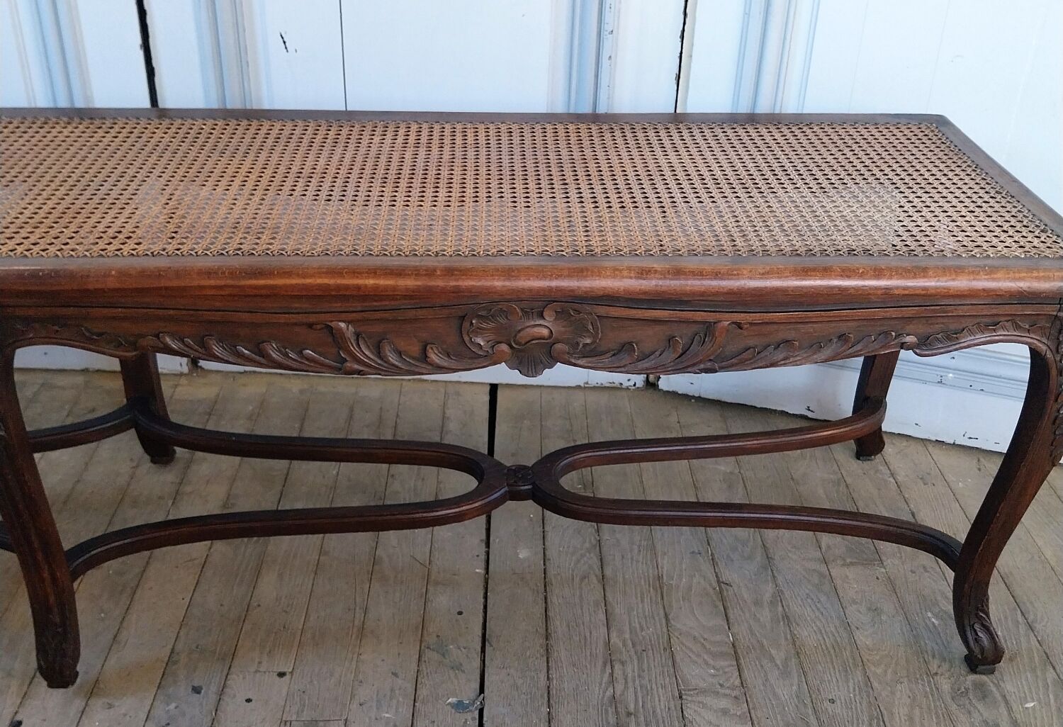 Louis XV style bench with cross-braced design