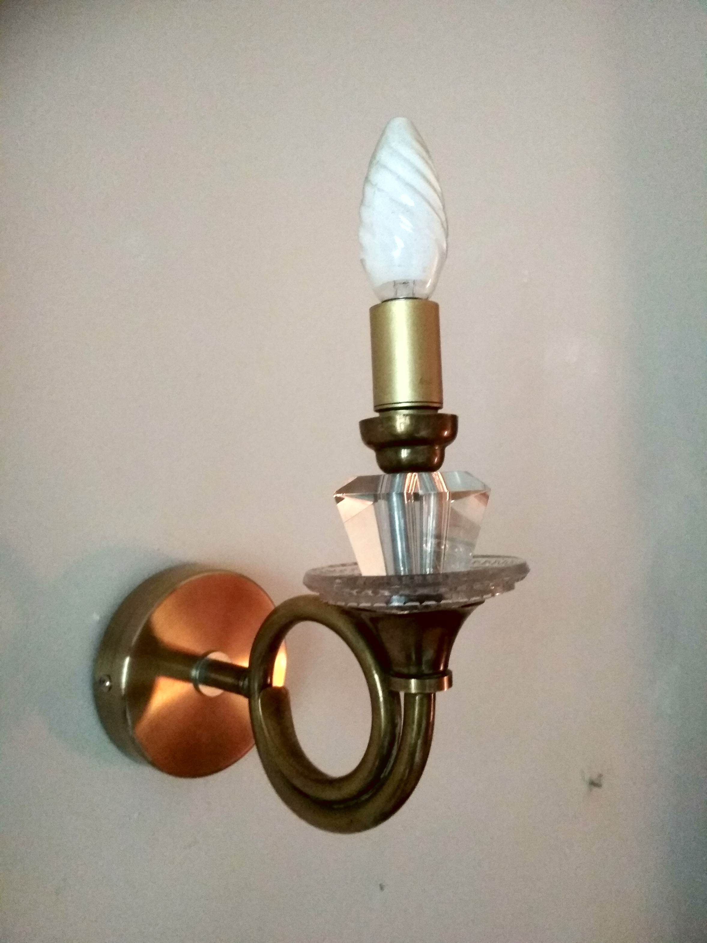 Pair of old brass wall sconces