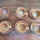 Service with 6 cups and saucers in stoneware.