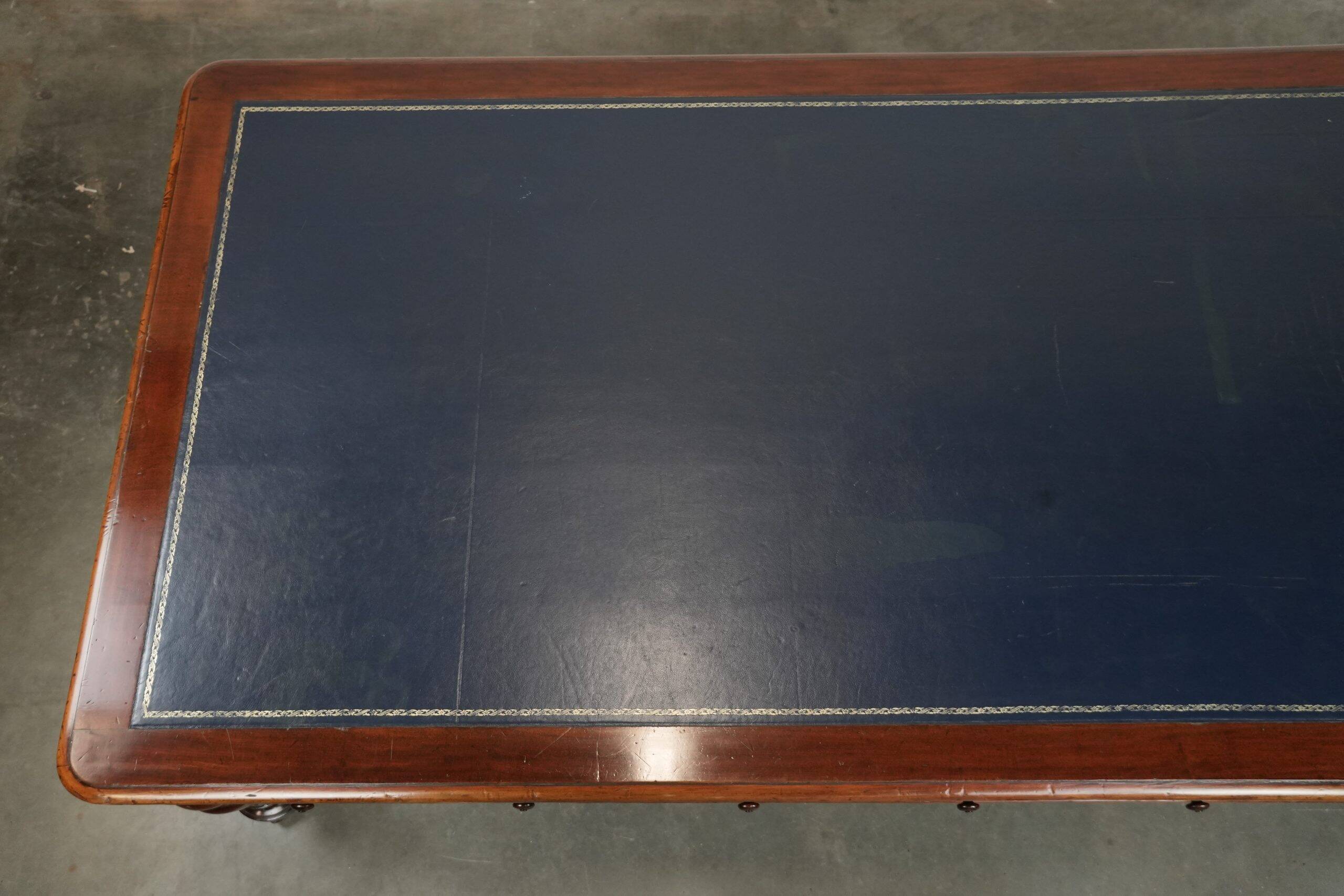 Antique English library table / writing table / desk from the 19th century