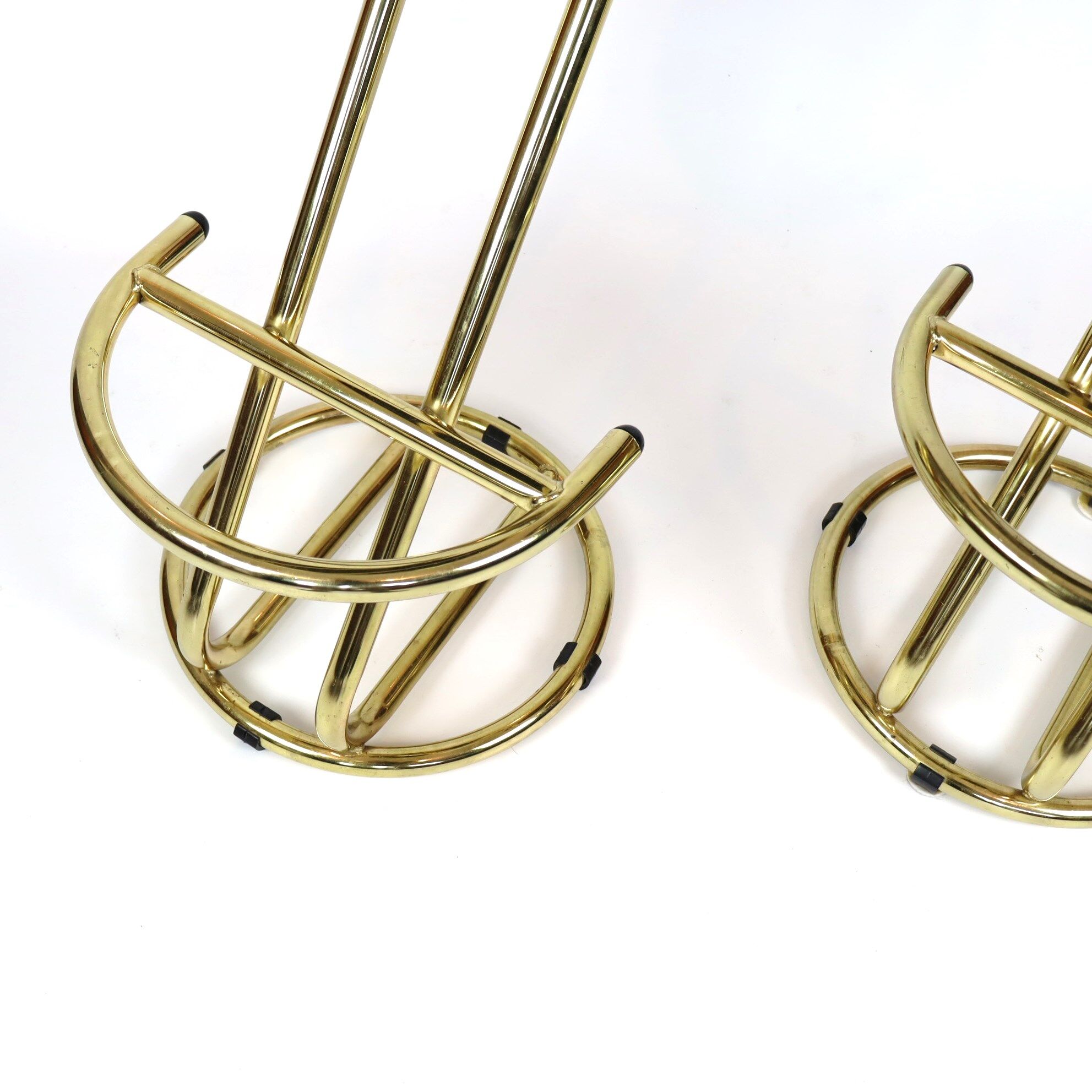 Pair of high brass stools