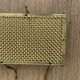 Gold metal mesh wall coat rack