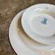 Léon Graves cake plate in earthenware, "Marie-Louise" service.