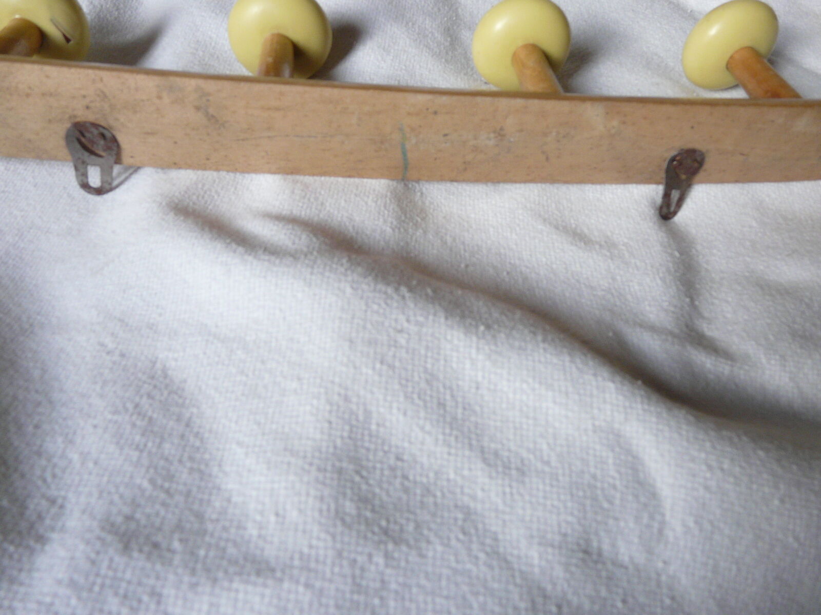Wearing coat wooden with colored balls