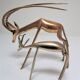 Four vintage brass antelope gazelles