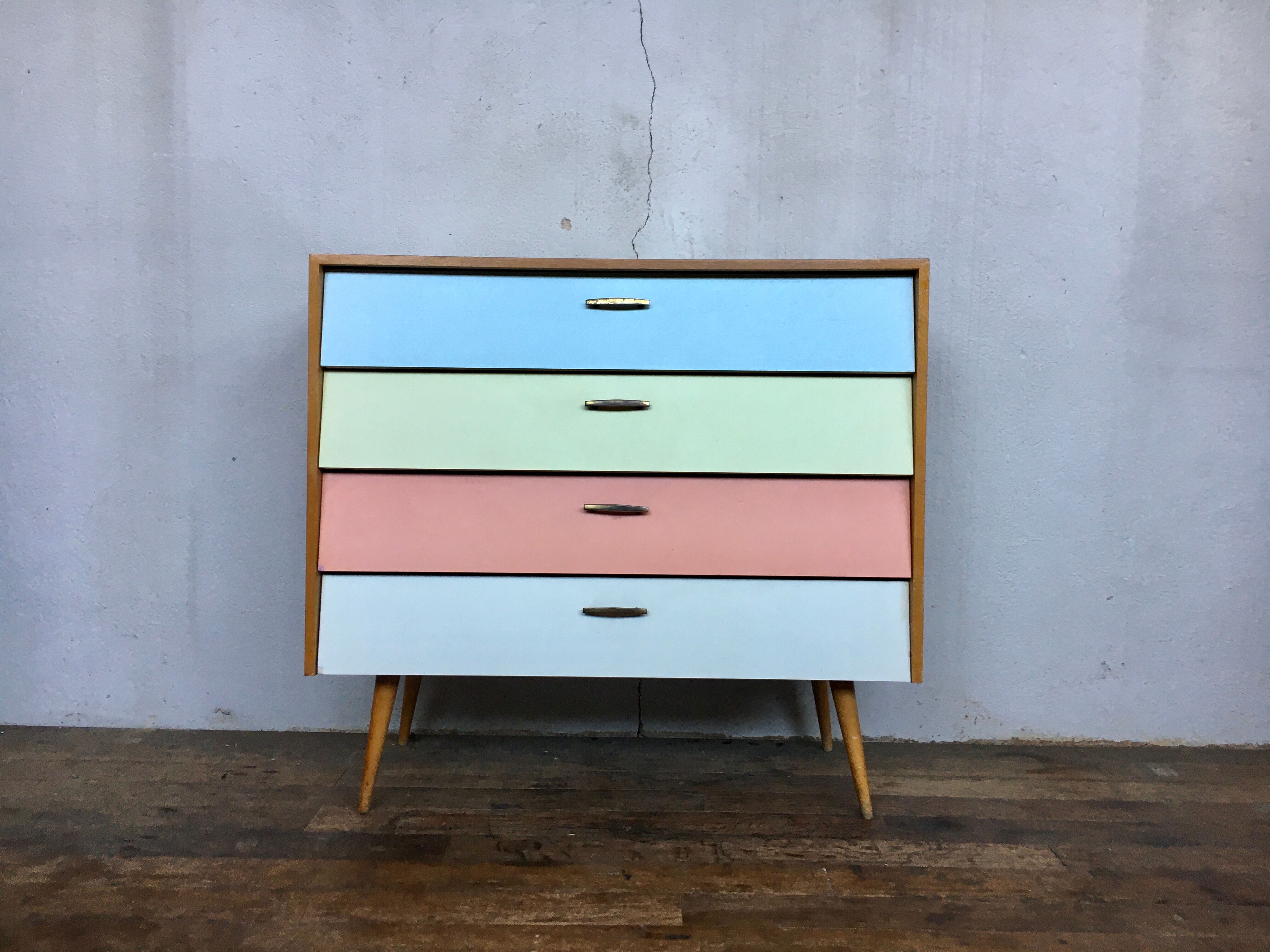 50s color formica shoe cabinet with compass feet
