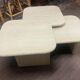 Modular pull-out coffee tables in travertine