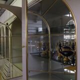Showcases in lacquered wood, glass and brass  1970s, set of 4