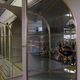 Showcases in lacquered wood, glass and brass  1970s, set of 4
