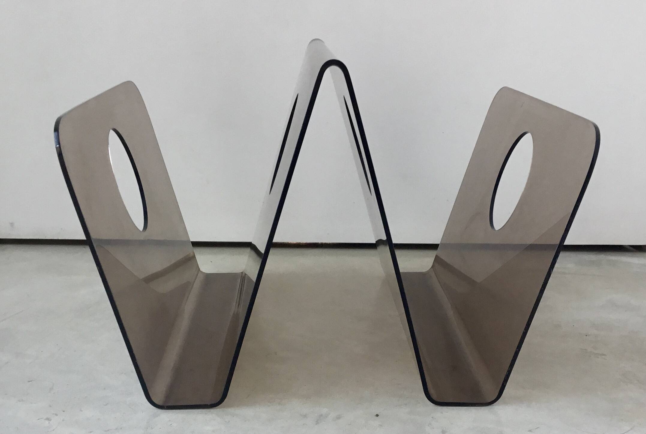 Acrylic magazine rack in the shape of a W - 1970s design.