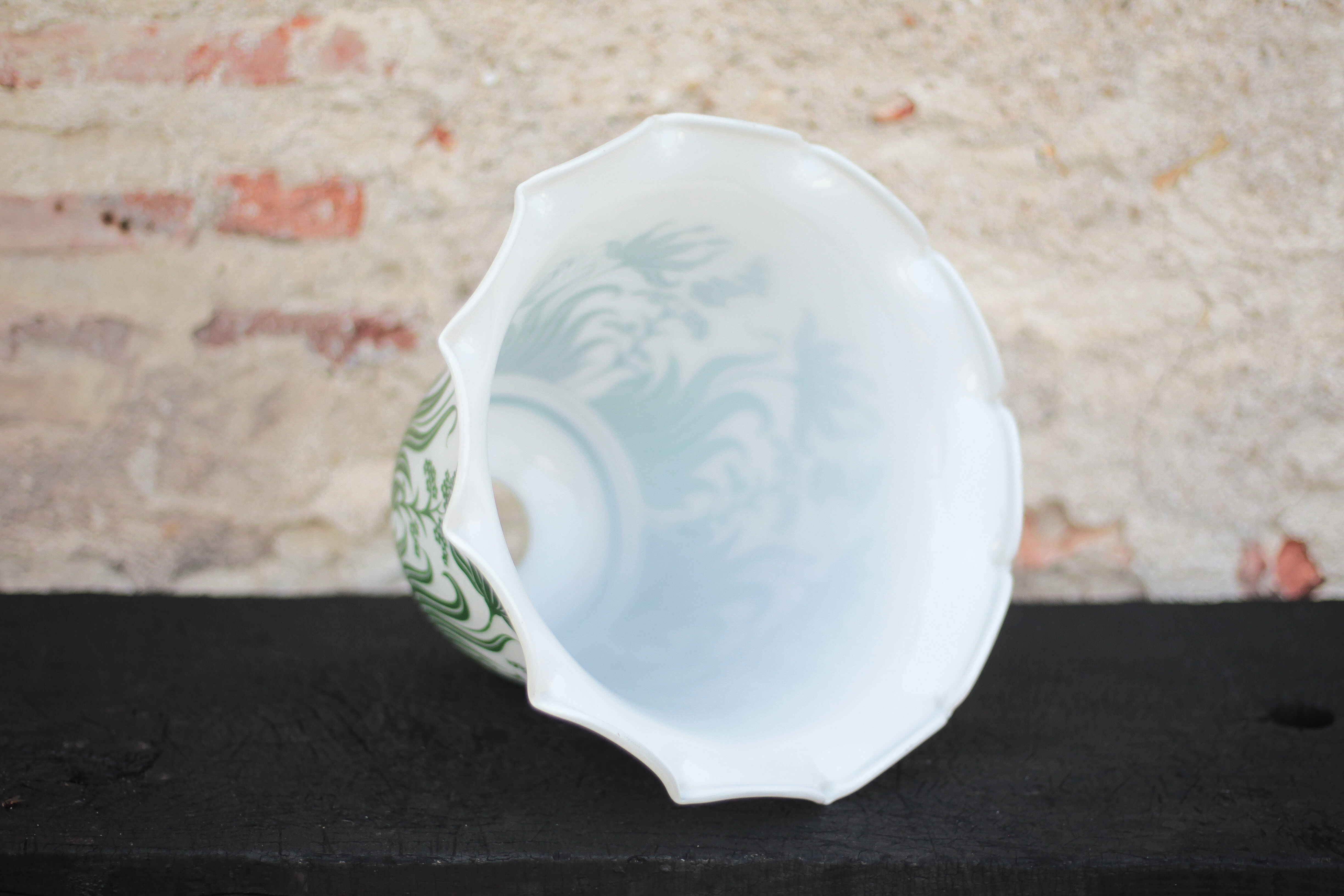 Opaline globe with green flower patterns, bell-shaped lampshade with a corolla.