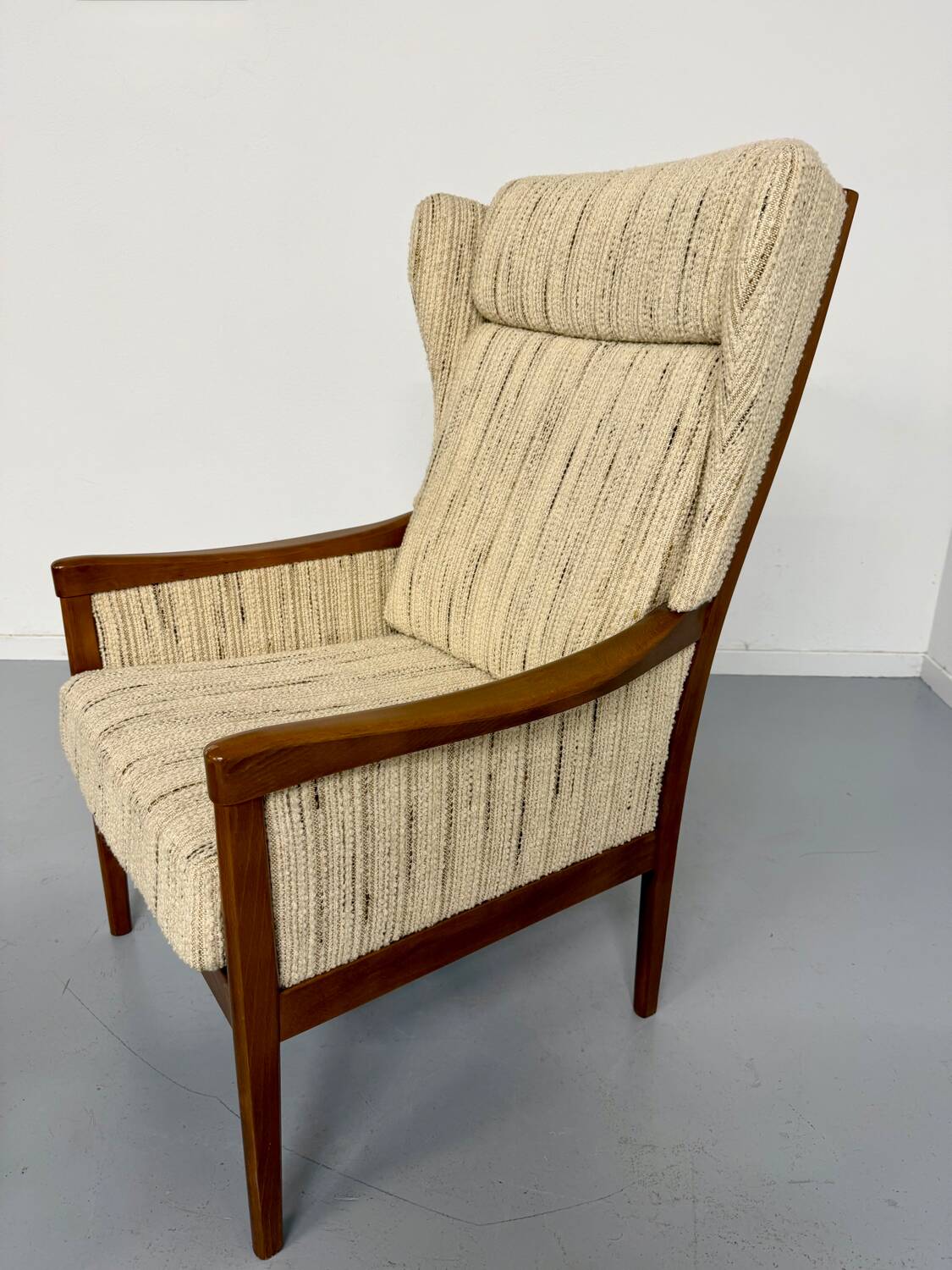 Vintage Casala wingback armchair with ottoman, 1970s design