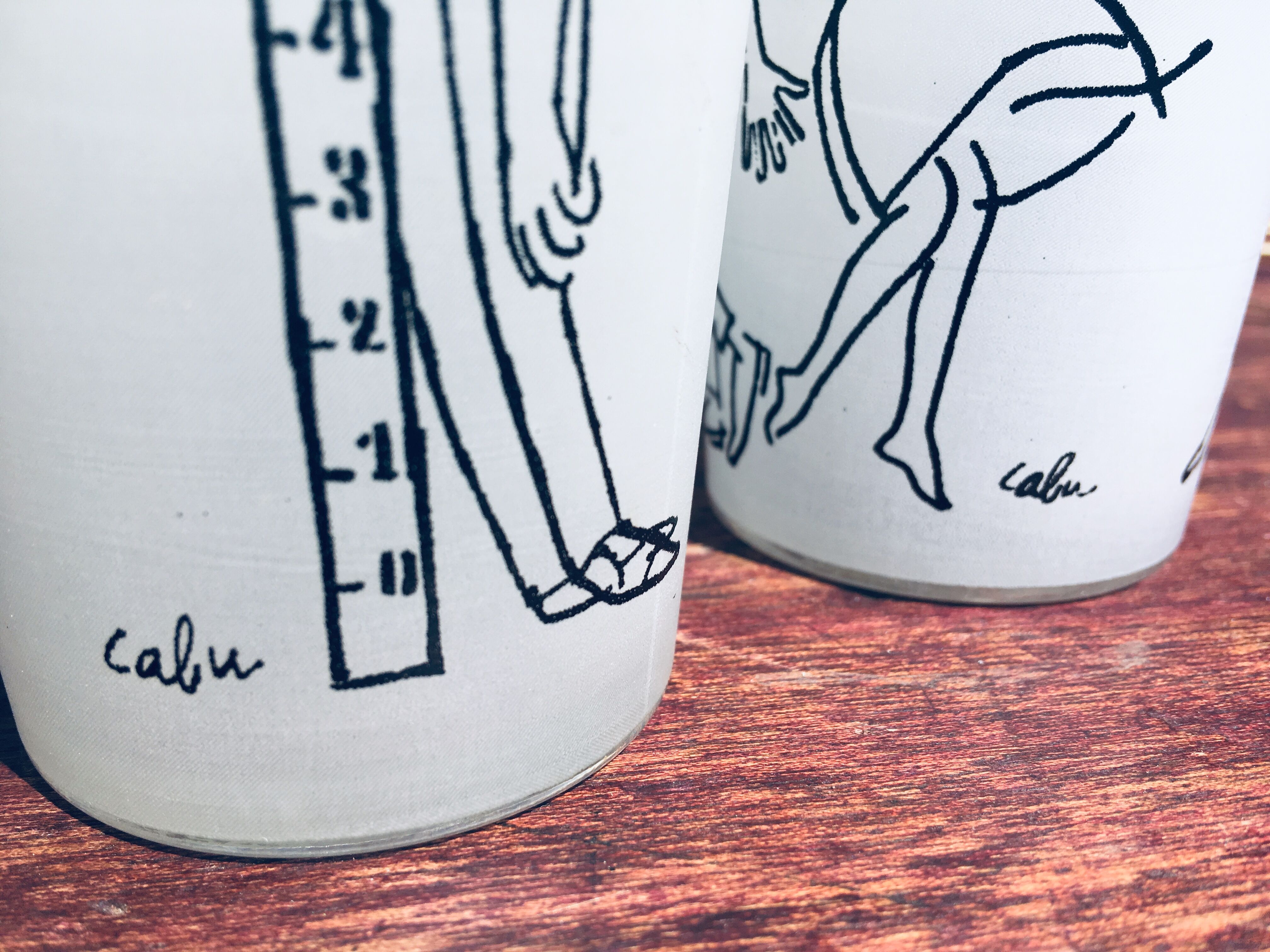 Set of glasses drawn by Cabù