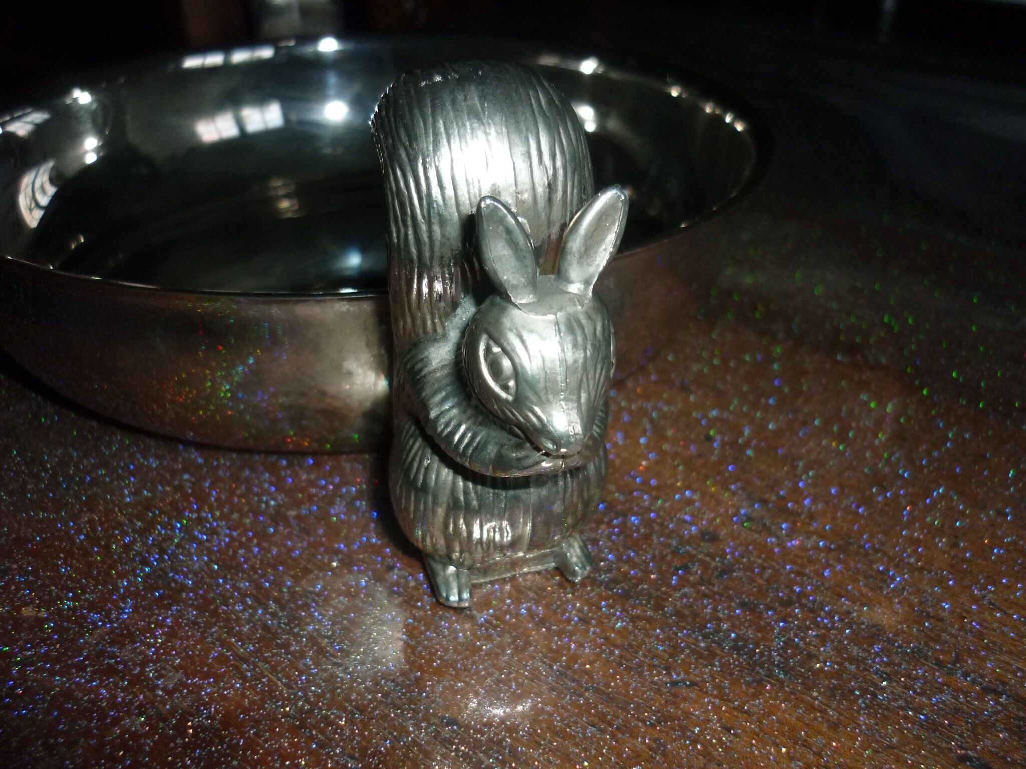 Silver metal dish with squirrels