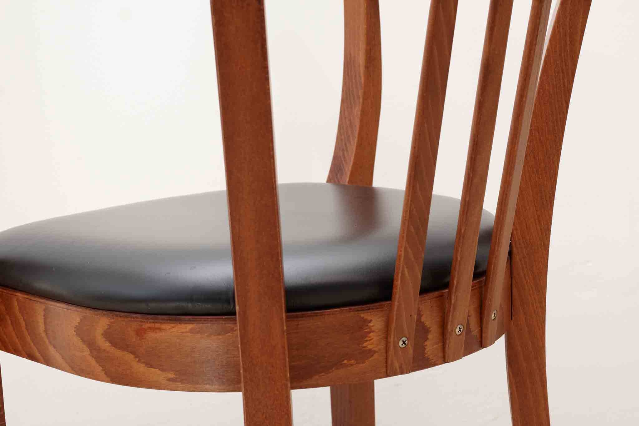 Stoelcker chair in black faux leather and oak