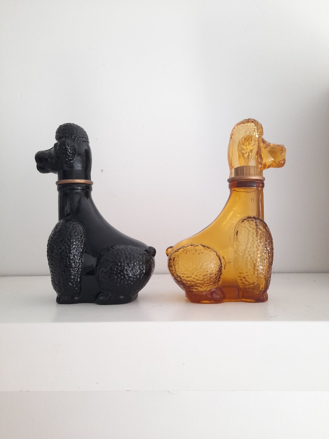 Set of two Empoli poodle glass bottles