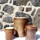 Trio of stoneware pots with lids
