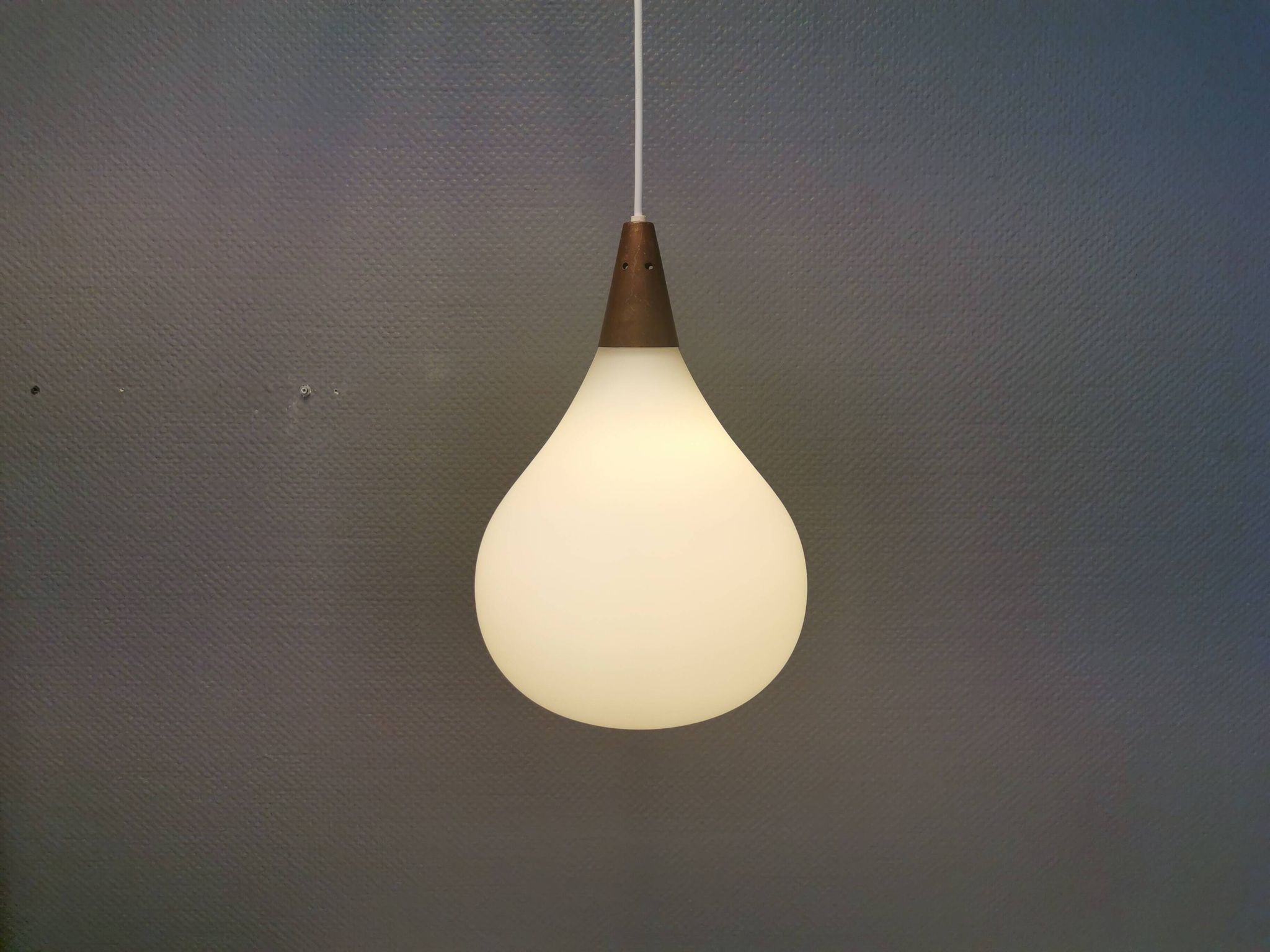 Large hanging lamp in white opal glass with brass top. Danish and estimated from the 1970s.