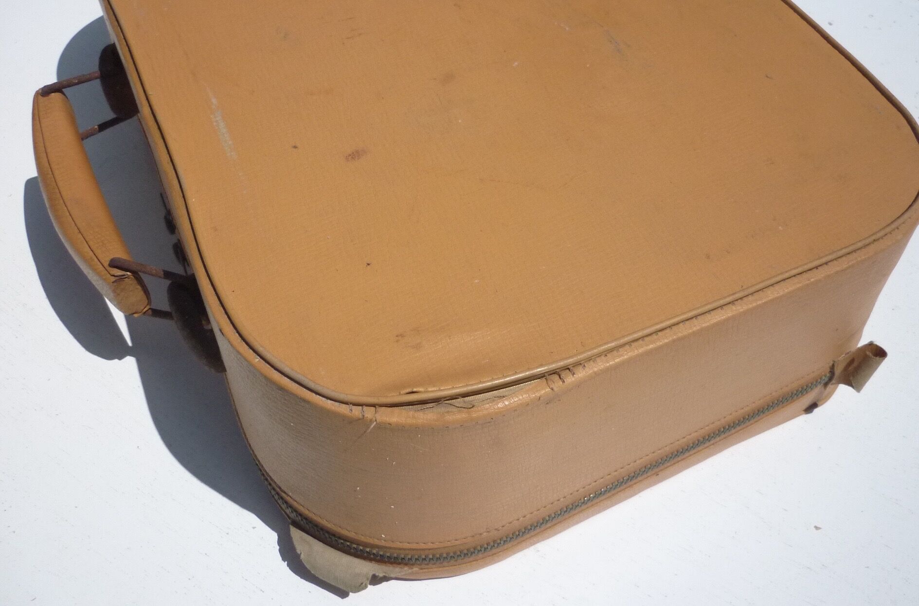 Old suitcase with zip