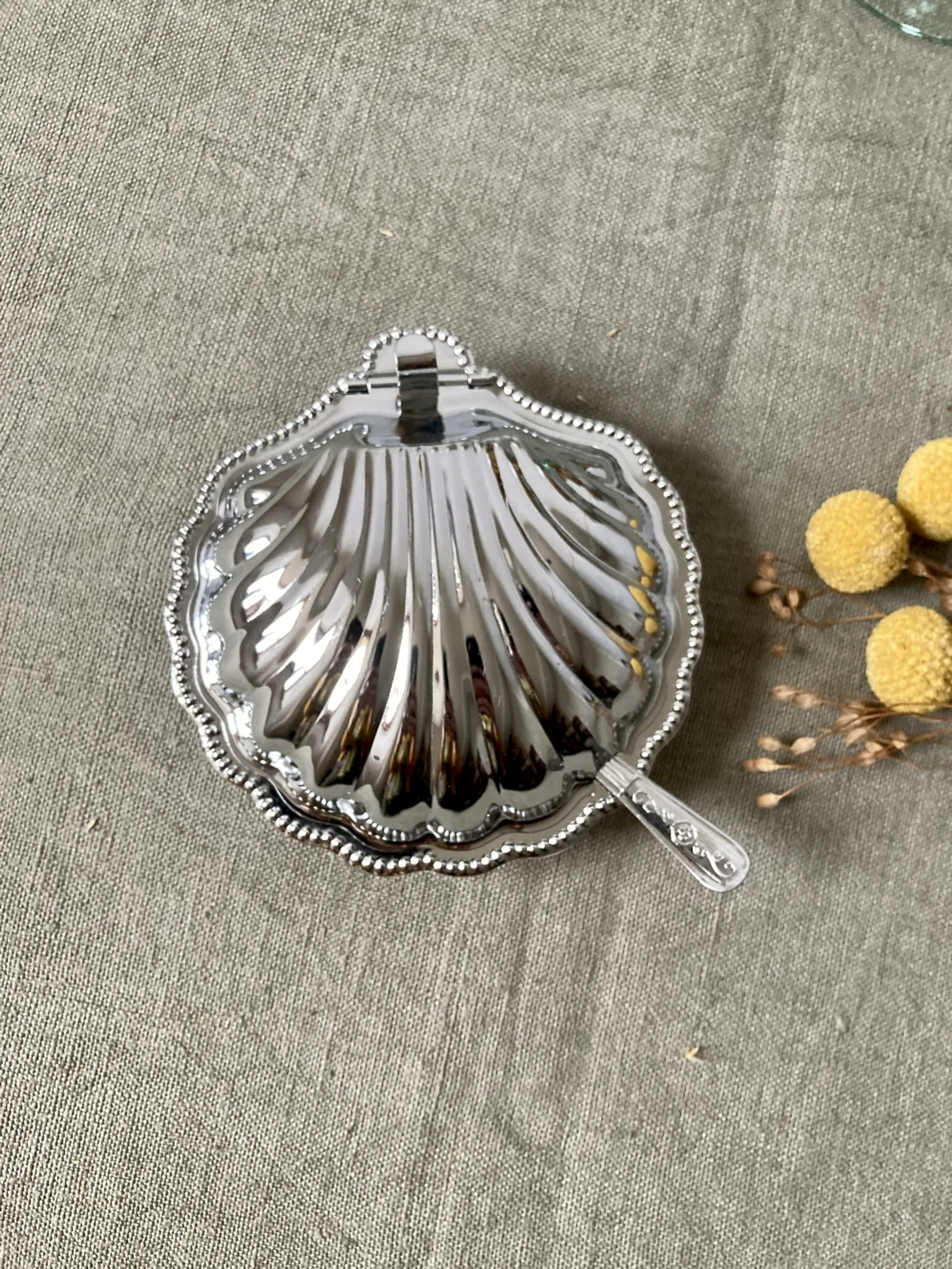 Metal shell butter dish with glass bowl and knife