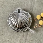 Metal shell butter dish with glass bowl and knife