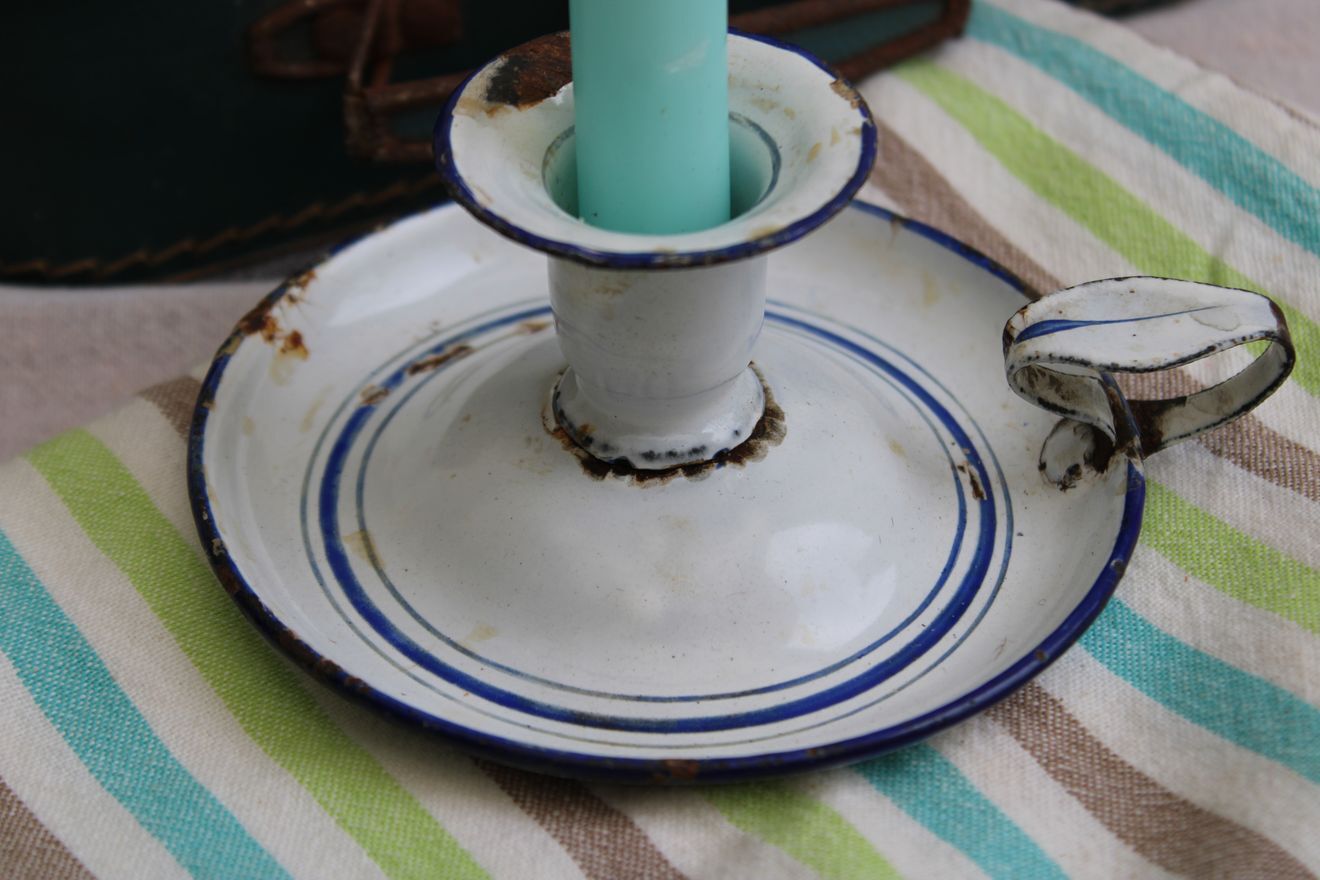Old enamel candle holder