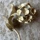 Ecru metal flower wall sconce