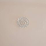 Round ashtray in chiseled glass