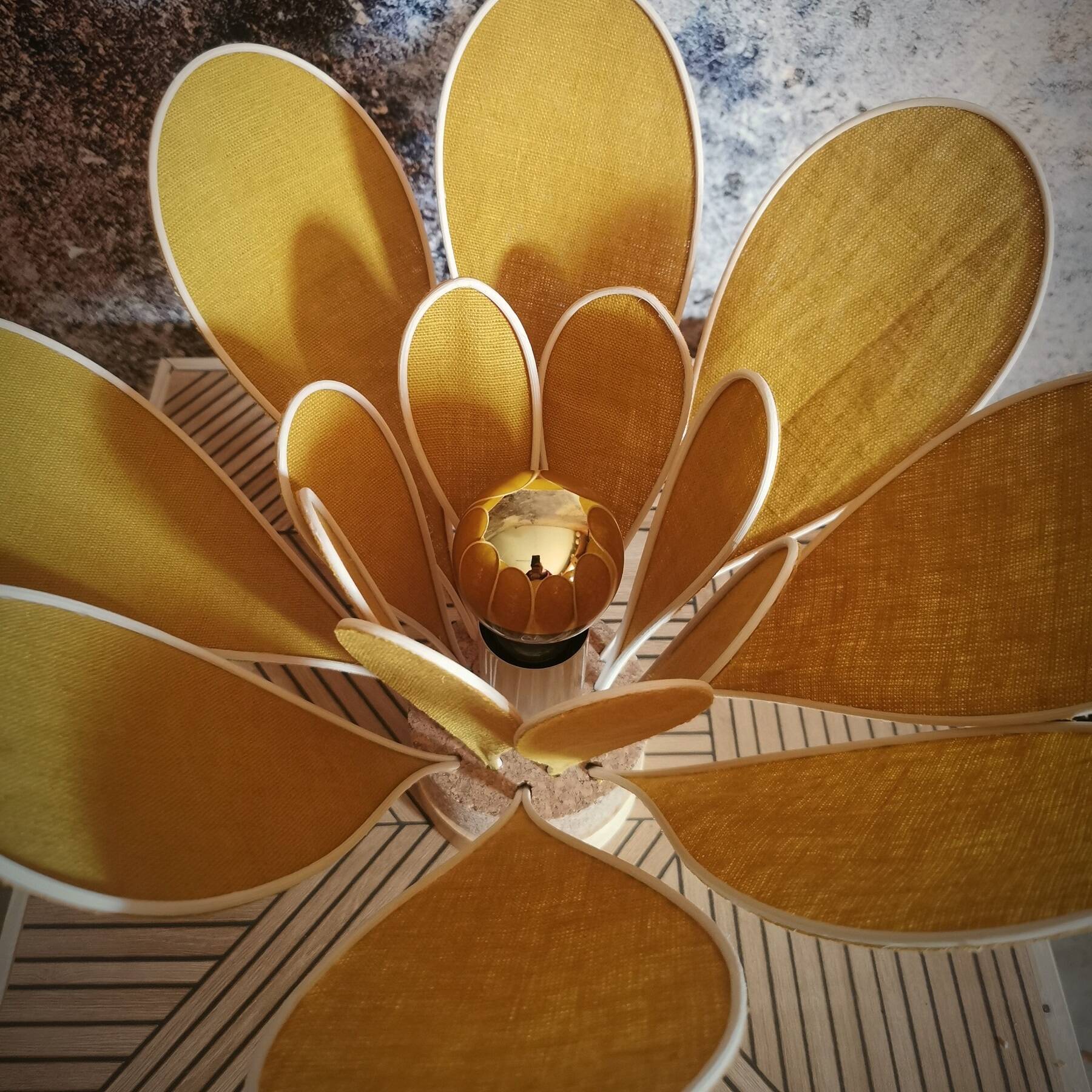 Flower table lamp made of rattan and saffron yellow linen petals