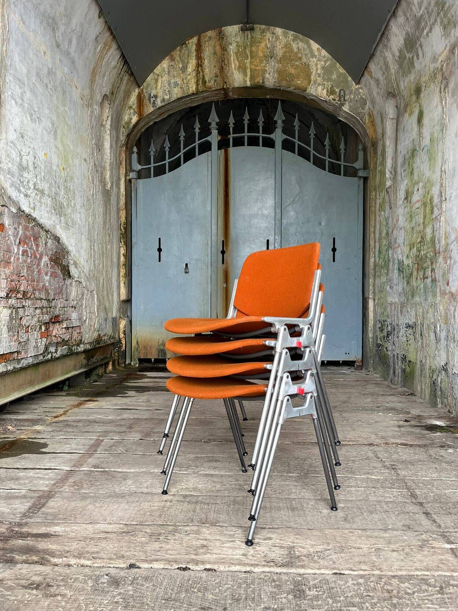 DSC 106 chair in orange by Giancarlo Piretti for Castelli, 1970s.