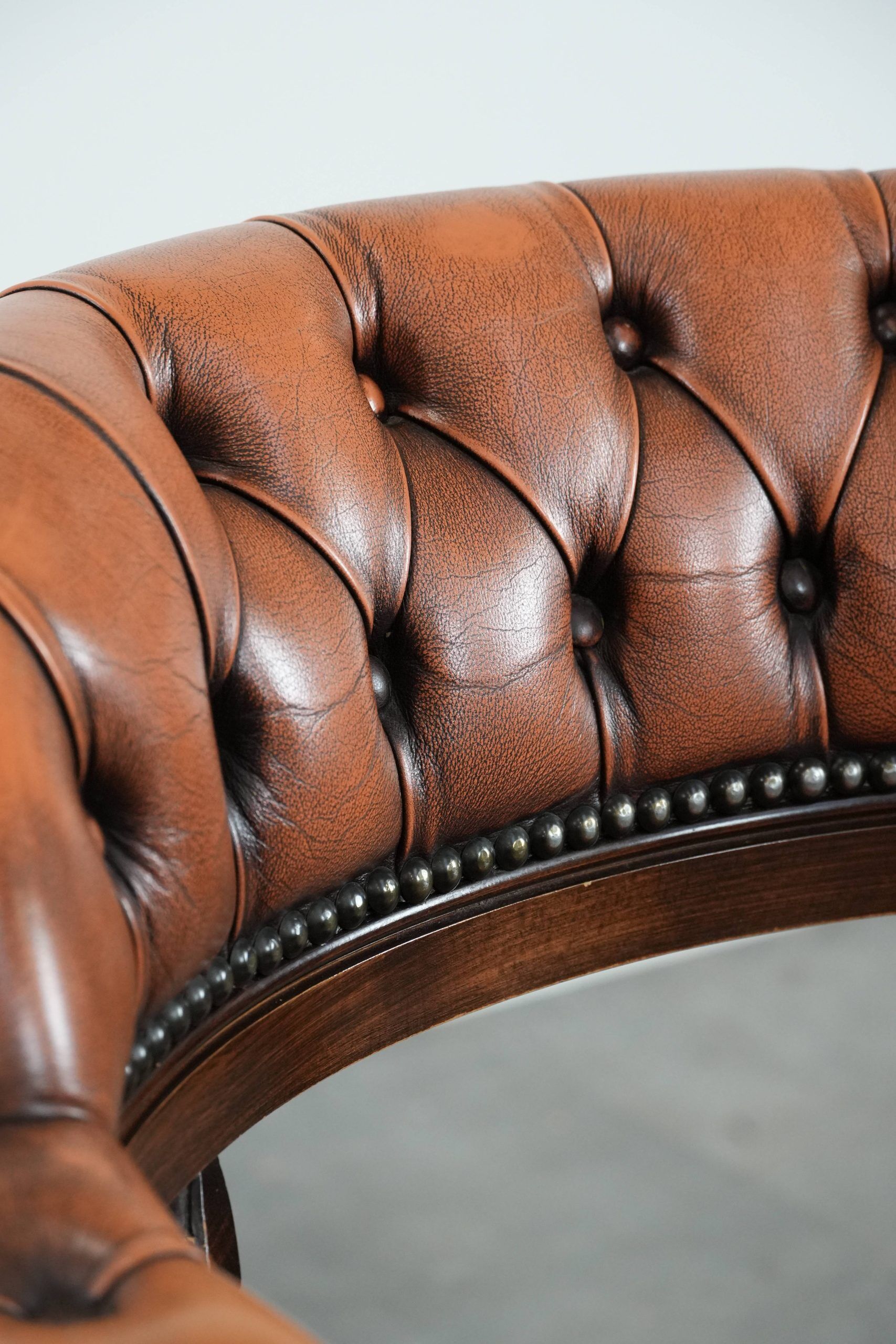 Classic and timeless cow leather and wooden Chesterfield office chair