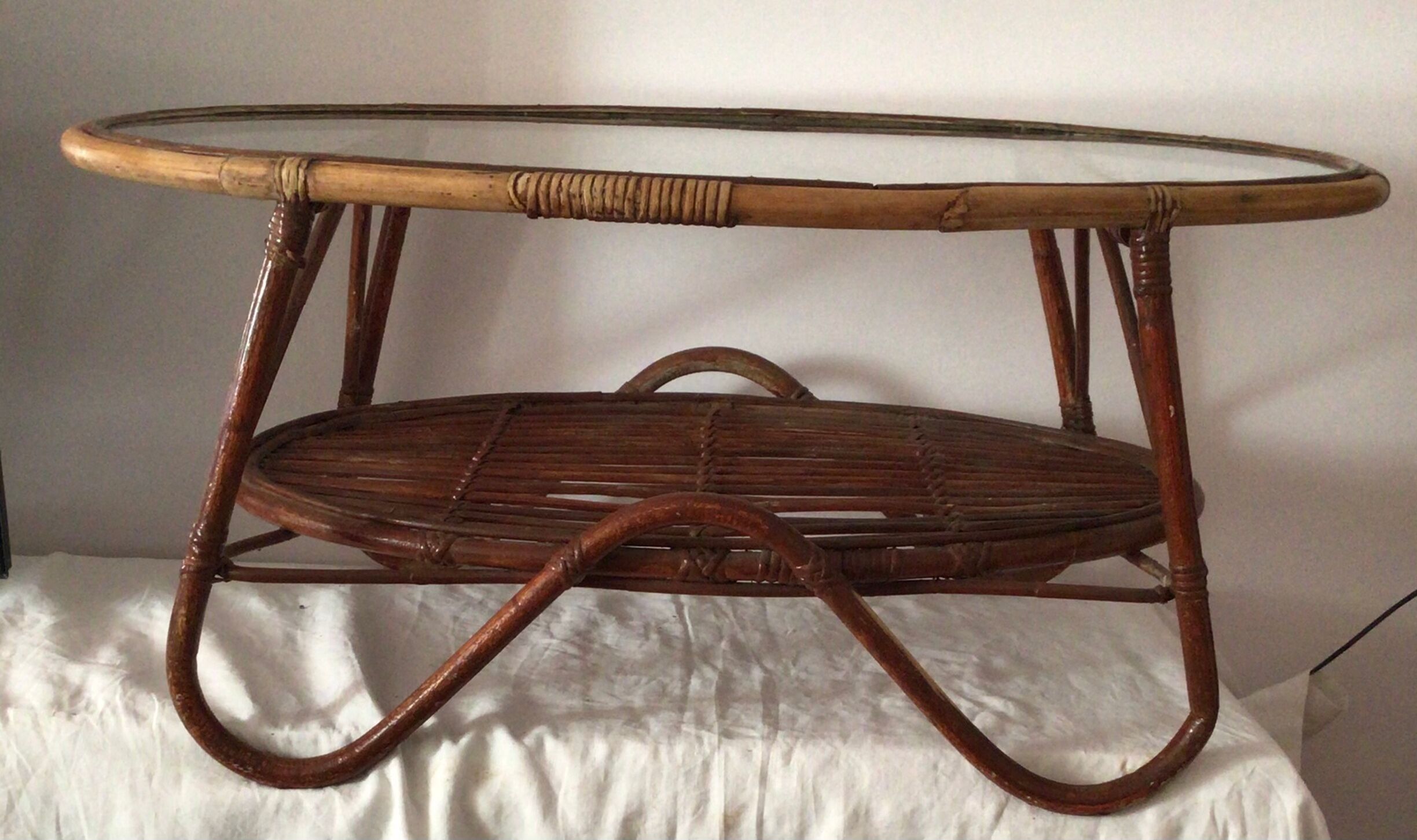 Vintage rattan oval-shaped coffee table